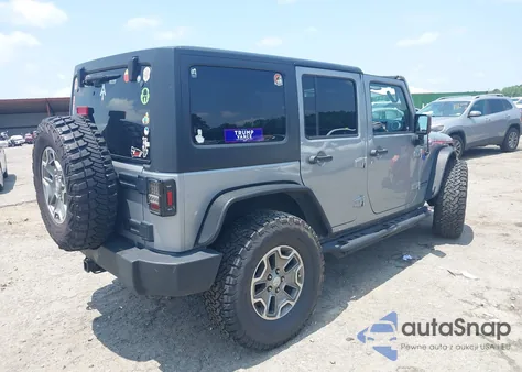 2014 Jeep Wrangler Unlimited Rubicon from USA, damaged, VIN 1C4BJWFGXEL182177